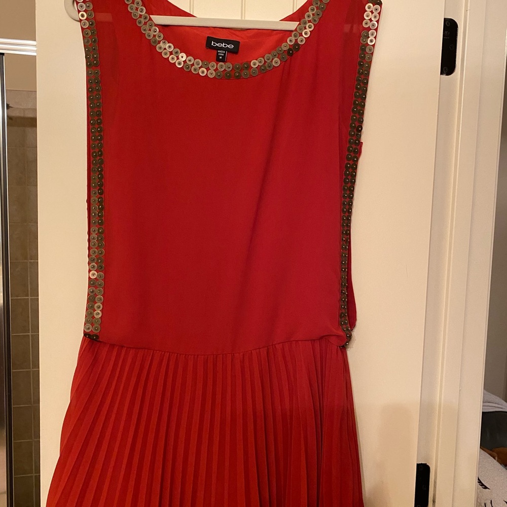 BEBE Mini red dress. size M